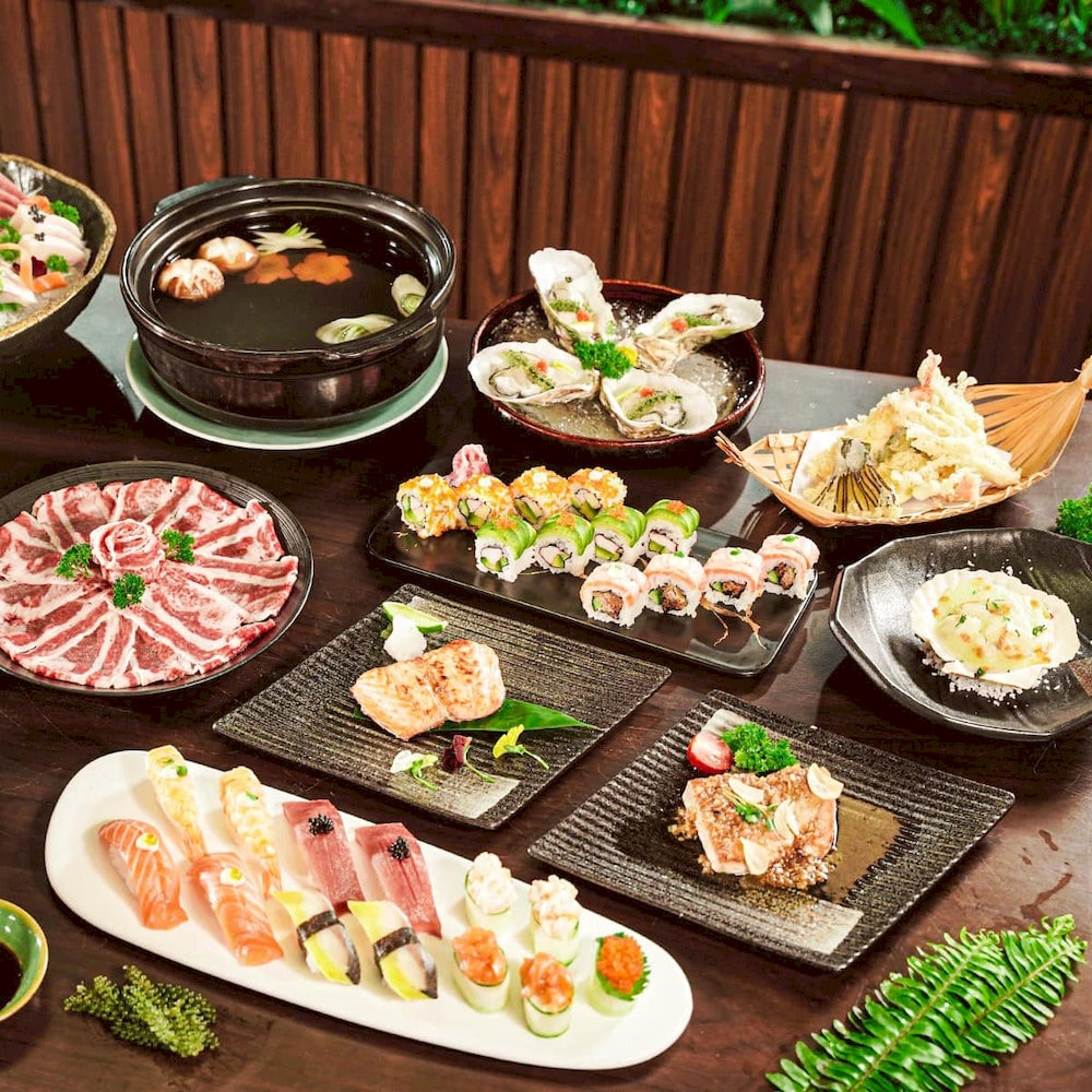 Tamaya offers a diverse menu featuring over 200 Japanese traditional dishes, including sushi, sashimi, and shabu shabu hotpot